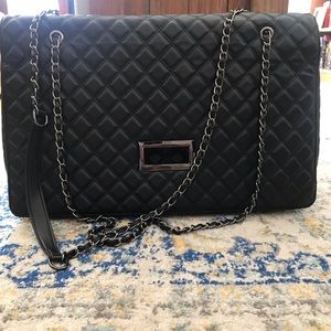 Black quilted carry on bag